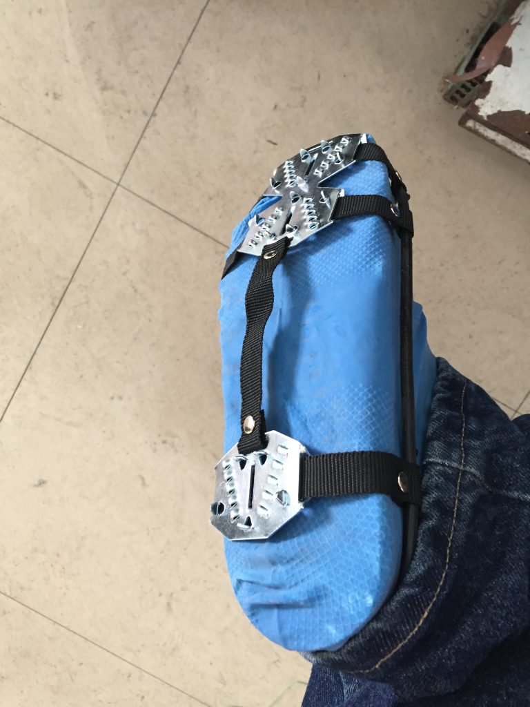 My lovely crampins and what could only be described as a shoe condom to keep my sneakers dry.