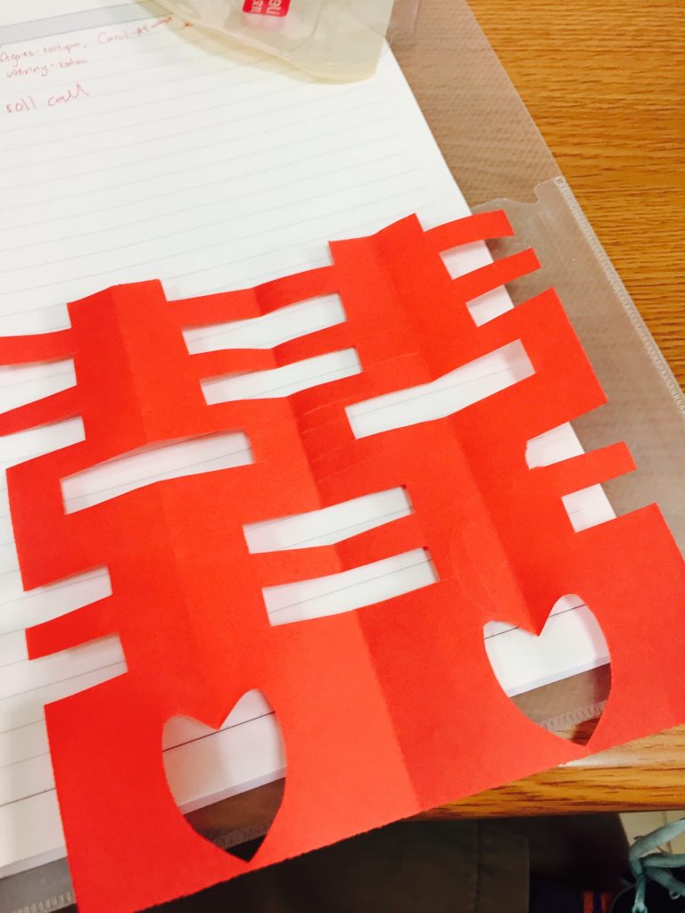 In one class they talked about the Chinese tradition of paper cutting and then we all got to make "double happiness" a common wedding papercut. Even I managed to do a good job.